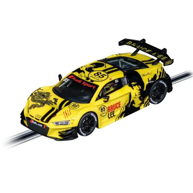 Gelb-schwarzes Slotcar mit Drachenmotiv, Nr. 85 und Bruce Lee-Schriftzug an Seite und Flügel.