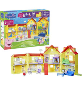 Peppa Pig Familienhaus-Spielset mit Figuren und Möbeln, aufgebaut vor der bunten Verpackung.