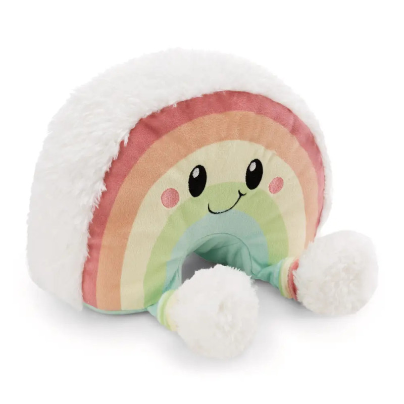 Kissen in Regenbogenform mit lächelndem Gesicht, weißen, flauschigen Enden und pastellfarbenem Bezug.