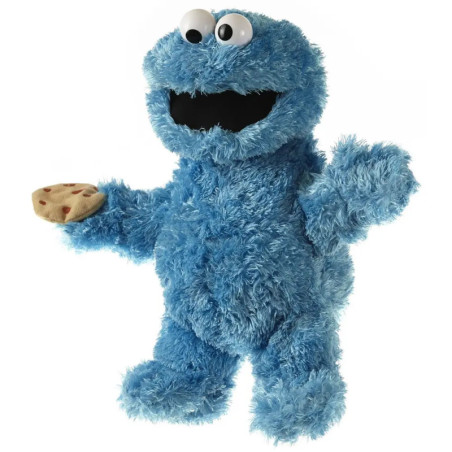 Blaues, zotteliges Puppenwesen mit Glubschaugen hält einen Keks vor weißem Hintergrund.