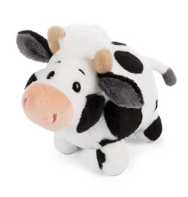 Stoffkuh mit schwarzen Flecken, rosa Schnauze, braunen Hörnern und weißer Schwanzspitze vor weißem Hintergrund.