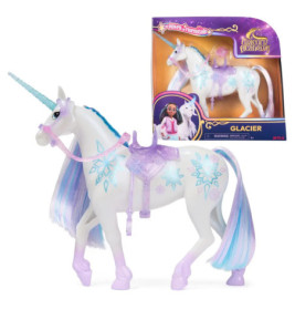 Weißes Einhorn-Spielzeug mit blau-lila Mähne, Schneeflocken-Design und Verpackung mit Mädchenfigur.