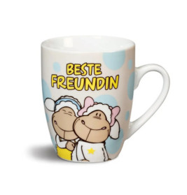 Tasse mit zwei umarmenden Schaf-Cartoons und gelbem BESTE FREUNDIN-Schriftzug auf Tupfen-Hintergrund.