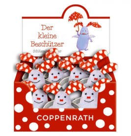 Box mit Plüsch-Schlüsselanhängern: weiße Figuren mit rot gepunkteten Mützen, Aufschrift Der kleine Beschützer.