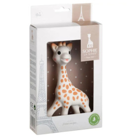 Sophie la Girafe Beißspielzeug in weißer Verpackung mit Eiffelturm-Illustration und gepunktetem Hintergrund.