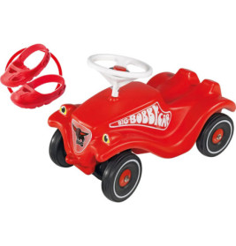 Rotes Rutschauto mit weißem Lenkrad und passenden roten Fußschützern.
