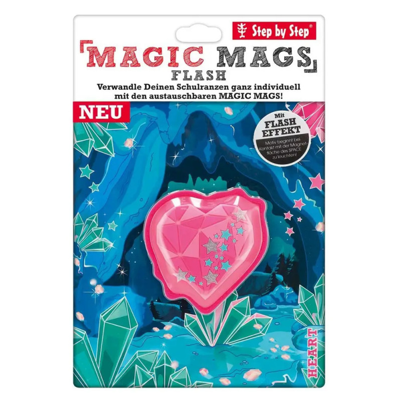 Herzförmiges, pinkes Magic-Mags-Accessoire in blauer, sternenverzierter Verpackung.