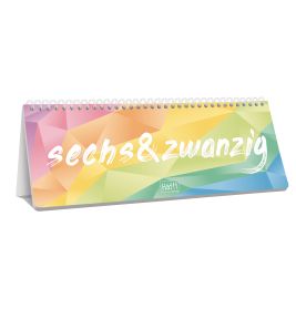 Bunter Tischkalender mit "sechs&zwanzig" in weißer Schrift auf geometrischem Regenbogen-Hintergrund.