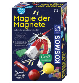 Box eines deutschen Experimentierkastens Magie der Magnete mit Hufeisenmagnet und bunten Objekten darauf.