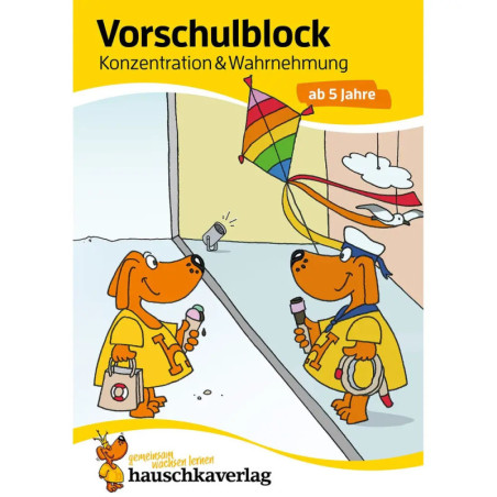 Zwei Hunde in gelben Mänteln lassen auf dem Cover von Hauschka Vorschulblock - Konzentration und Wahrnehmung einen Drachen steig